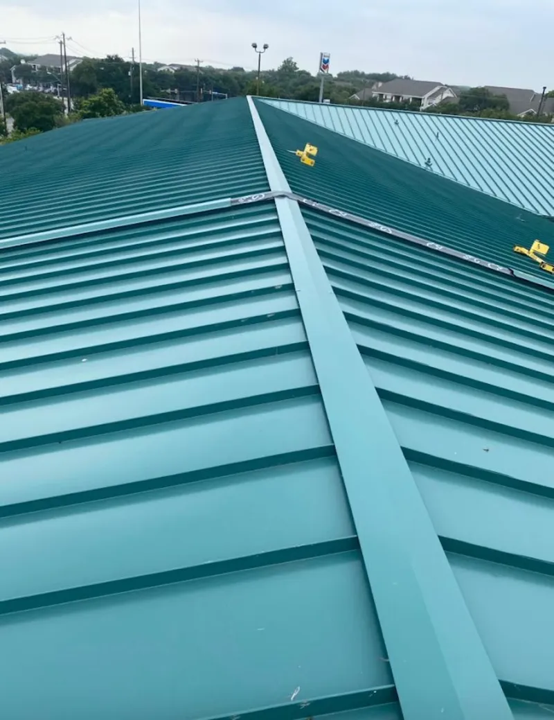 Green commercial metal roof ridge and valley for Metal Roof Repair in Rochelle Park